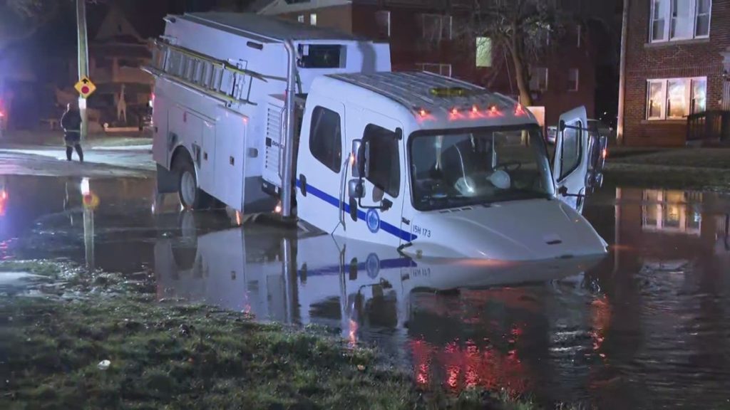 Truck becomes stuck in sinkhole amid water main break in Cleveland: See video from the scene - WKYC.com