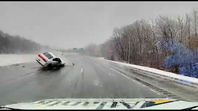 See ambulance driver’s quick reaction to car flipping across highway - CNN