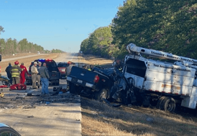 Two critically injured after driver of pickup crashes into parked bucket truck - KFDM-TV News