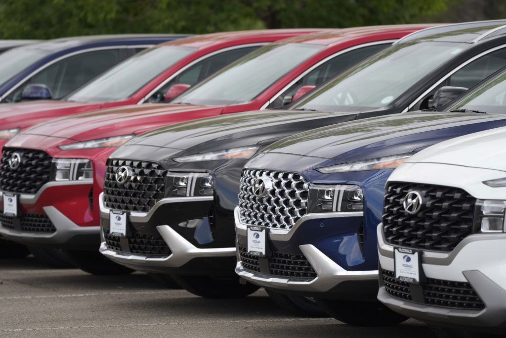 FILE - A line of 2022 Santa Fe SUV's sit outside a Hyundai dealership Sunday, Sept. 12, 2021, in Littleton, Colo. Hyundai Motor America and Kia America will resolve class-action lawsuit prompted by a surge in vehicle thefts with a settlement agreement that could be valued at $200 million, the automakers announced Friday, May 19, 2023. (AP Photo/David Zalubowski, File)