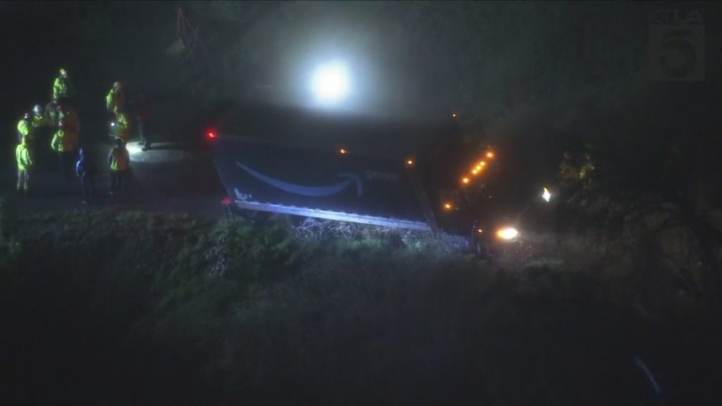 Amazon delivery truck stuck on hillside, threatening home below - KTLA Los Angeles