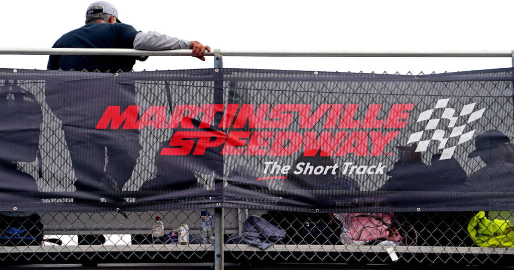 Oct 30, 2022; Martinsville, Virginia, USA; A fans looks on from the top of the grand stands during the Xfinity 500 at Martinsville Speedway. Mandatory Credit: Peter Casey-USA TODAY Sports