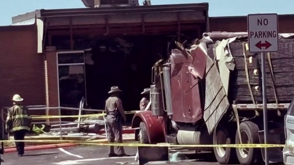 Truck driver rams stolen semi-truck into public safety building in Texas, police say - NBC News