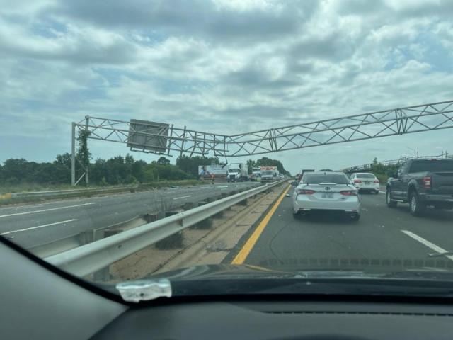 I-440 shutdown after dump truck crashes into overhead sign - WRAL News