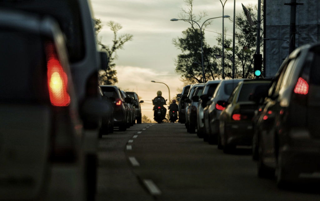 Rows of vehicles at the traffic light area