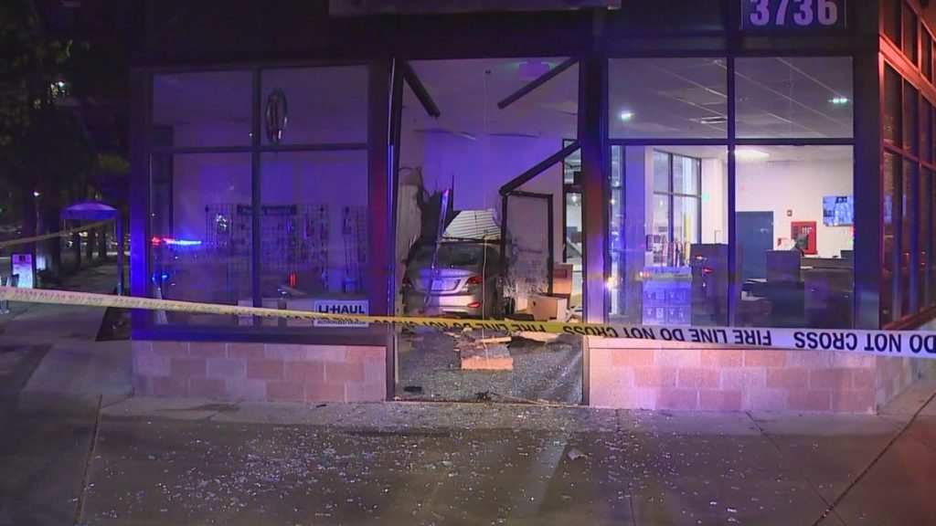 Car smashes into Seattle storage facility - KING5.com