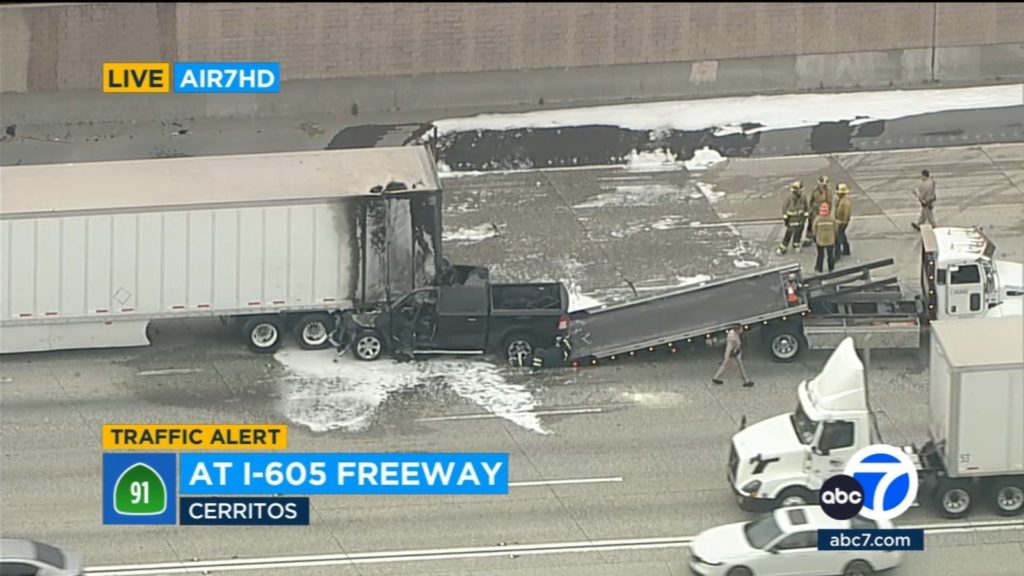 Pickup truck slams into stalled big rig on EB 91 Freeway in Cerritos; fiery crash snarls commute - KABC-TV