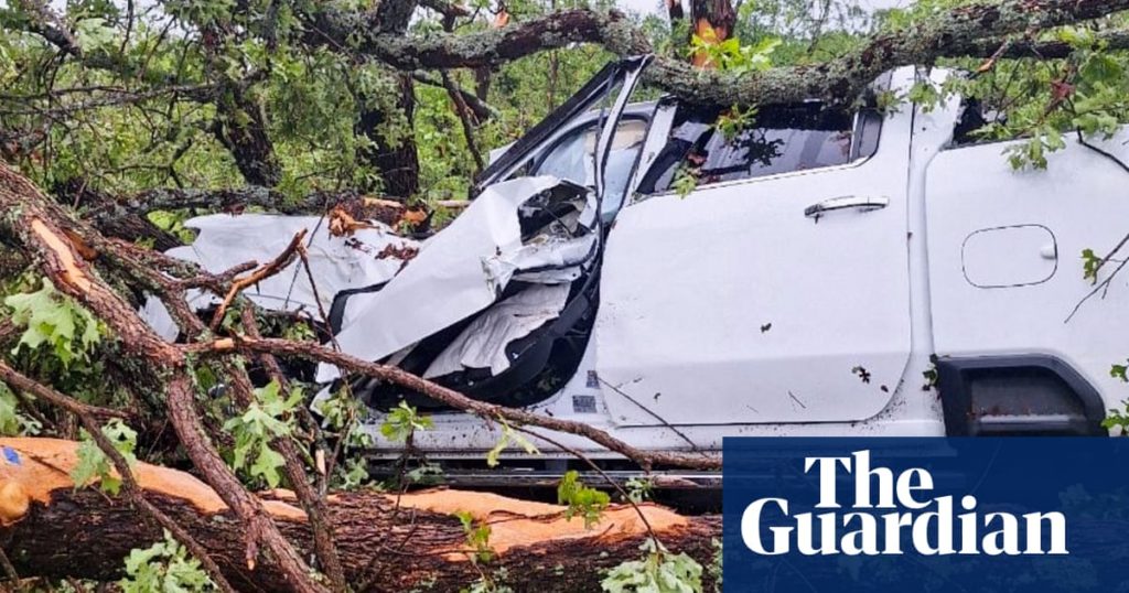 ‘Don’t die, I will be back’: Oklahoma boy saves parents after tornado tosses truck - The Guardian US