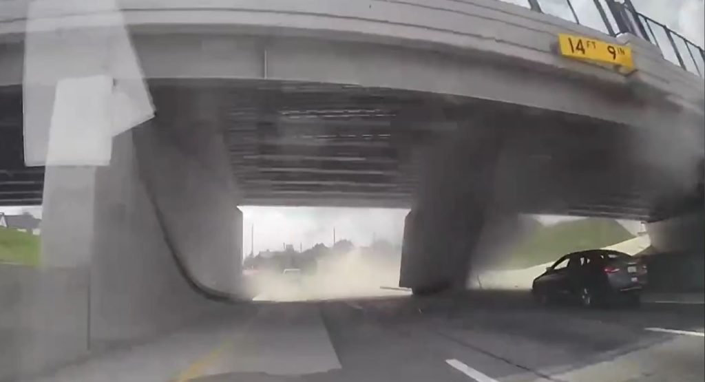 Video shows moment truck hauling gravel slams into overpass on I-94 in Detroit - FOX 2 Detroit
