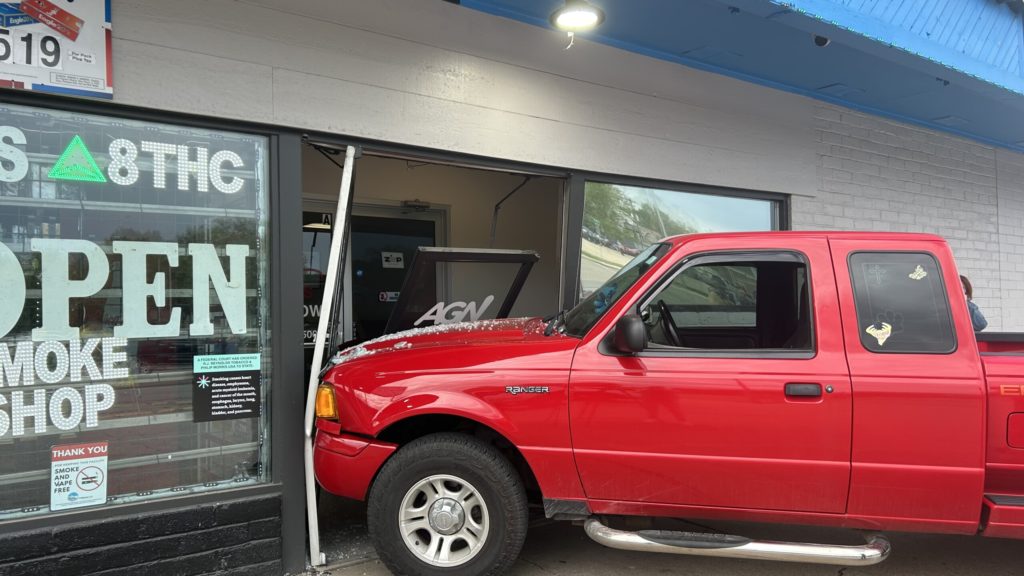 Pickup truck crashes into front door of Lincoln smoke shop - KLKN