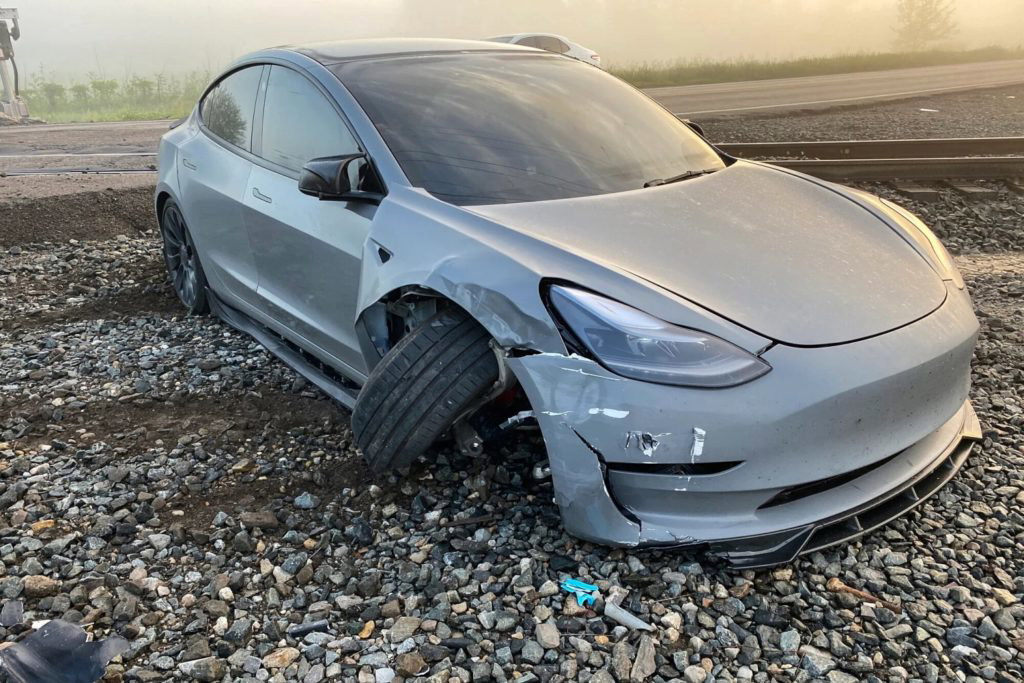 A Tesla owner says his car's 'self-driving' technology failed to detect a moving train ahead of a crash caught on camera - NBC News