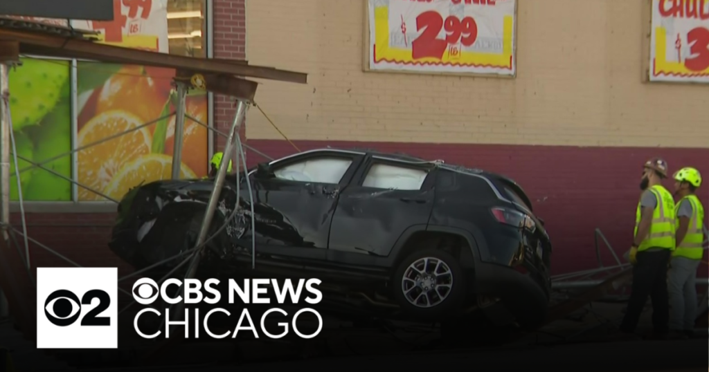 SUV runs red light, crashes into car, scaffolding on Southwest Side - CBS Chicago