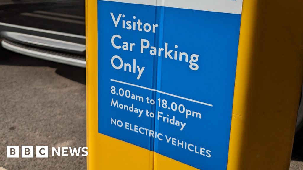 Electric car driver turned away from hospital car park - BBC.com