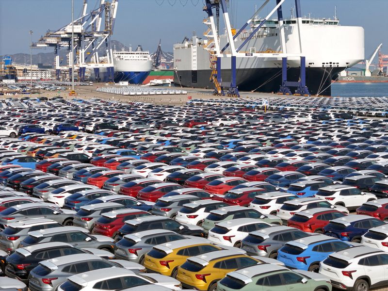 FILE PHOTO: Cars to be exported sit at a terminal in the port of Yantai, Shandong province, China January 10, 2024. China Daily via REUTERS/File Photo