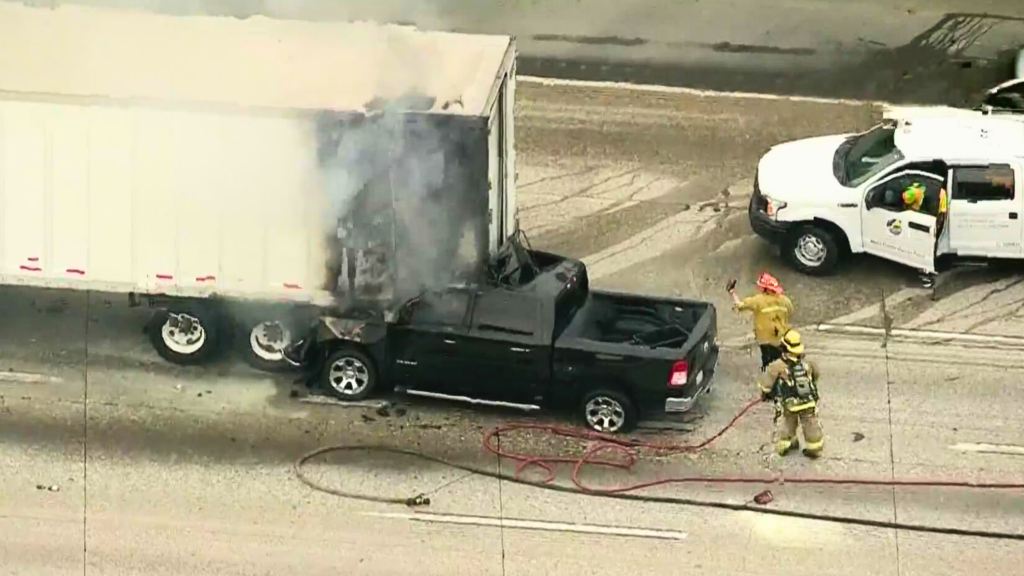 Truck pinned under big rig in fiery crash on Los Angeles County freeway - KTLA Los Angeles