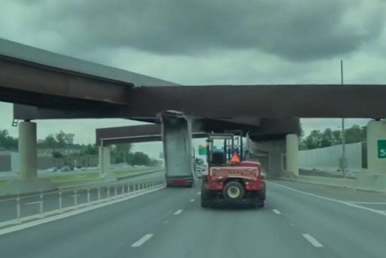 Dump truck's raised trailer hits overpass bridge in Virginia - UPI News