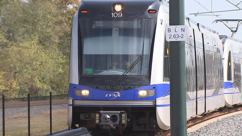 Car gets stuck on Light Rail, passengers shuttled off train - WSOC Charlotte