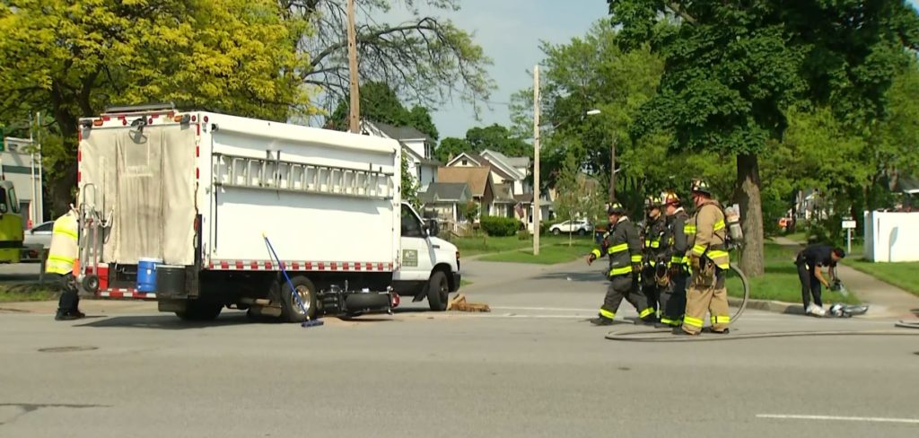 Man expected to survive after motorcycle collides with box truck, trapping him underneath - News10NBC