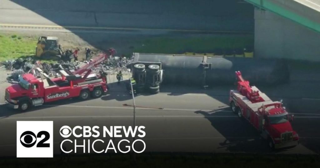Overturned truck spills scrap metal, blocks Indiana highway - CBS News