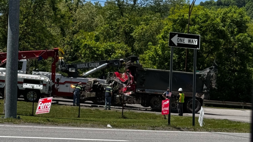 Man dies after a dump truck goes over an embankment and crashes 30-40 feet down after crossing West Virginia Route 2 - WTRF