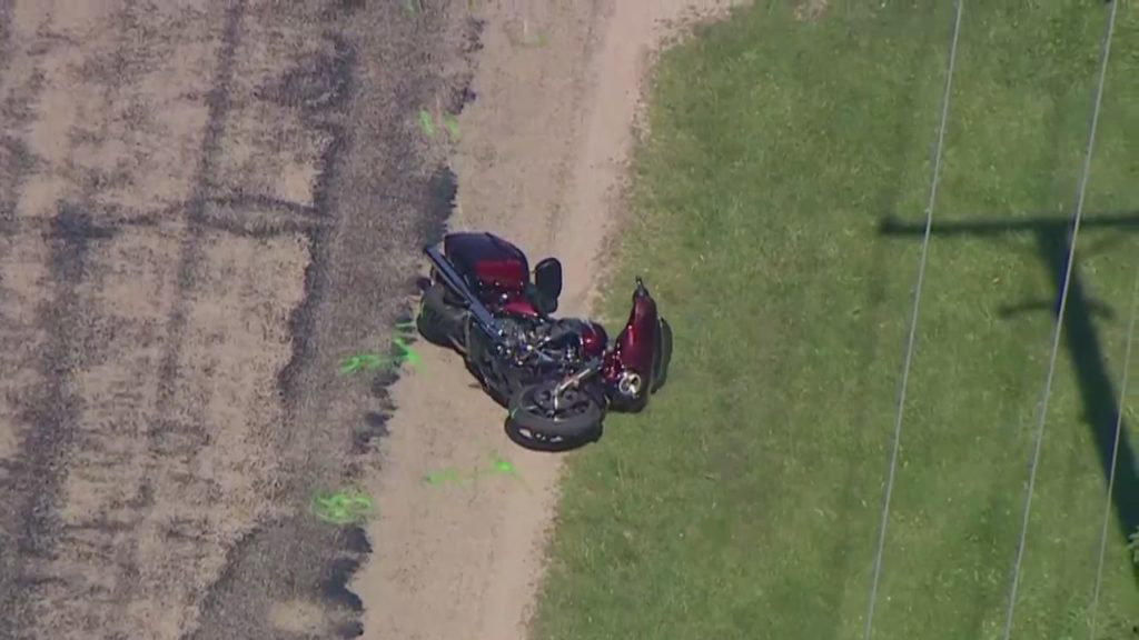 Man dead after motorcycle crash into school bus carrying 15 kids in Will County - WGN TV Chicago