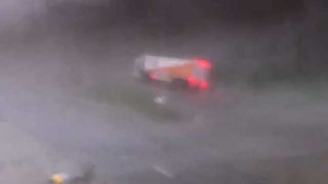 Video: Apparent tornado topples truck on Iowa highway - KCCI Des Moines