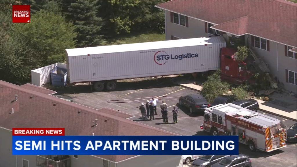 Truck drives off I-80, hits Morris apartment building after mechanical failure, police say - WLS-TV