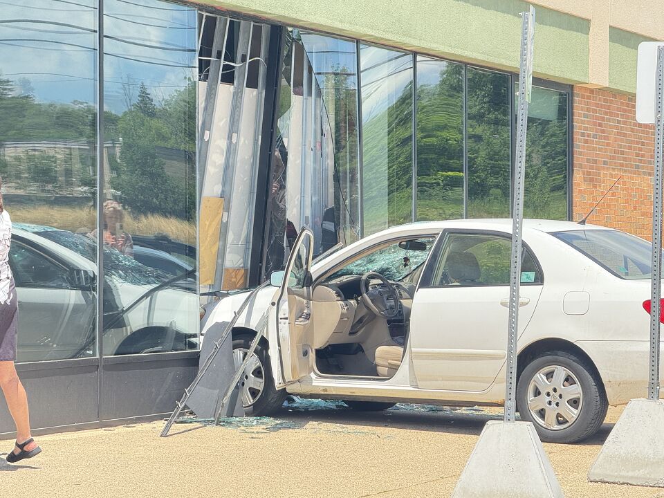 Driver crashes car through store window in Frandor - WLNS