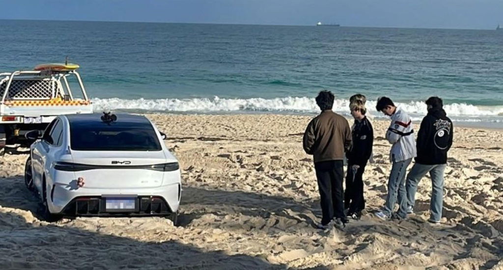 Electric car driver's embarrassing mistake as BYD ends up bogged on popular beach - Yahoo News Australia