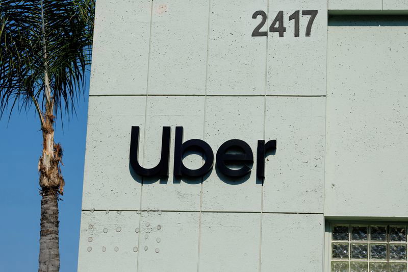 FILE PHOTO: The Uber logo is shown on the building in Los Angeles, California, U.S., February 14, 2024.  REUTERS/Mike Blake/File Photo