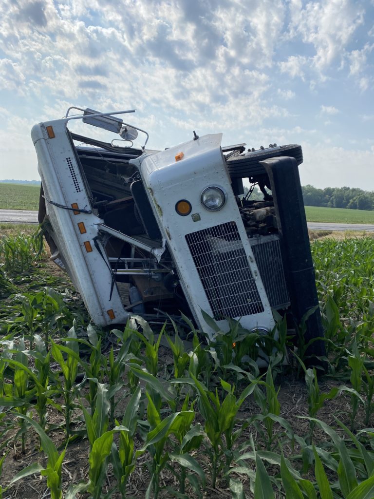 FedEx truck ends up in a DeKalb County field after driver overcorrects - WANE