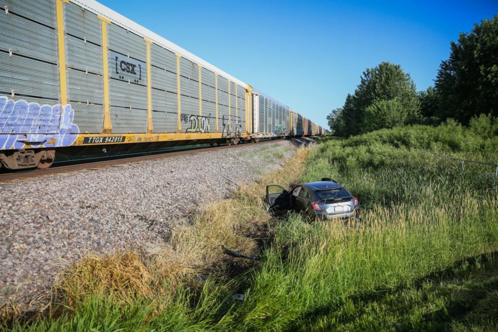 Woman injured after crashing car into moving freight train in unincorporated McHenry County - Lake and McHenry County Scanner