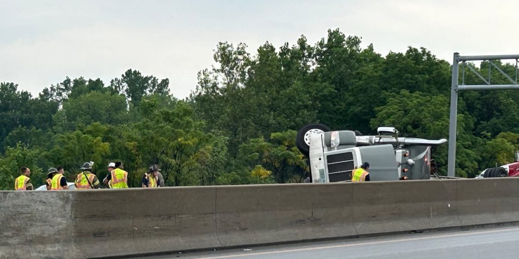 Flipped Semi truck on I-75, calling for hazmat - WTVG