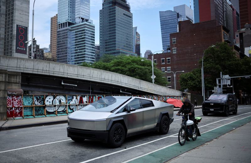 FILE PHOTO: A Tesla Cybertruck is pictured parked in the Manhattan borough of New York City, U.S. June 23, 2024. REUTERS/Agustin Marcarian/File Photo