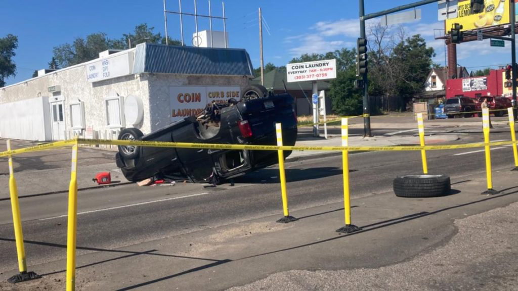 Police say carjacked SUV caused 2-car rollover crash - 9News.com KUSA