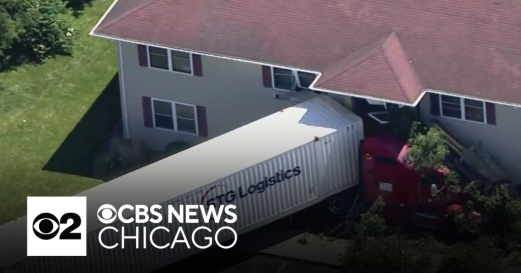 Truck crashes into apartment building in Southwest Chicago suburb - CBS News