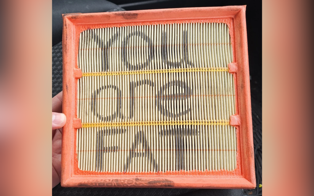 Man 'Livid' at Rude Message Found Written on Car Air Filter by Auto Shop - Newsweek