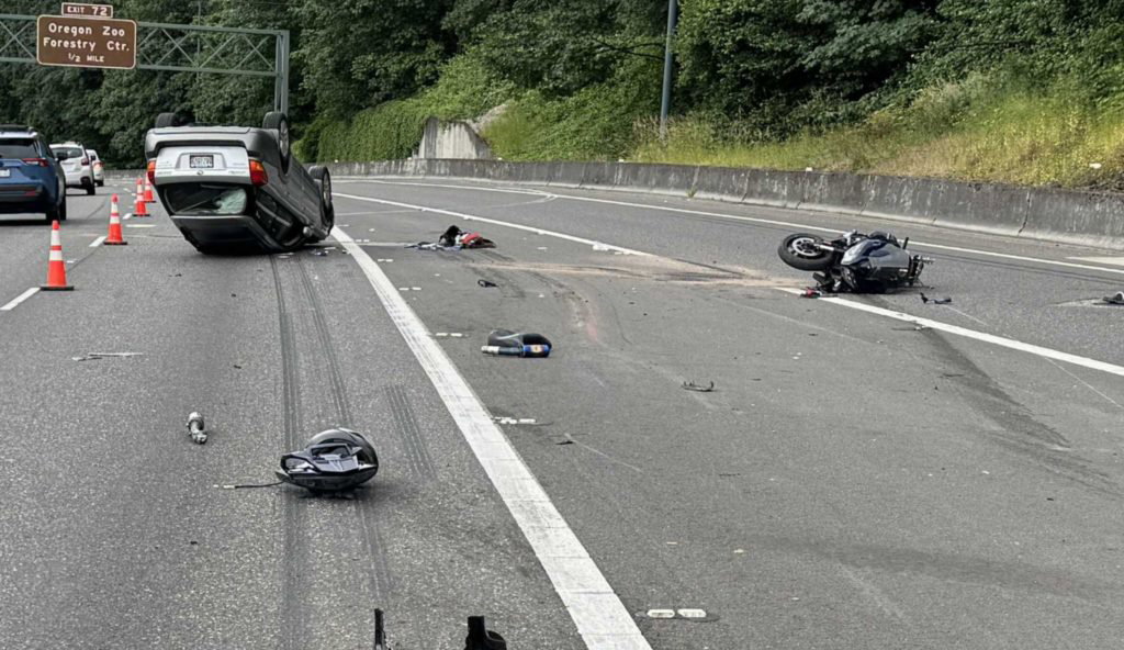 Man facing felony assault charges after car flips over on motorcyclist on Sunset Highway - KOIN.com
