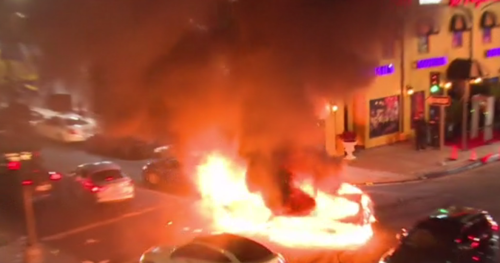 Street takeover with more than 50 cars in downtown LA leaves some in flames - CBS Los Angeles
