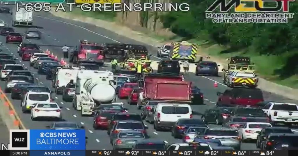 Rush hour traffic snarled on I-695 due to overturned dump truck - CBS News