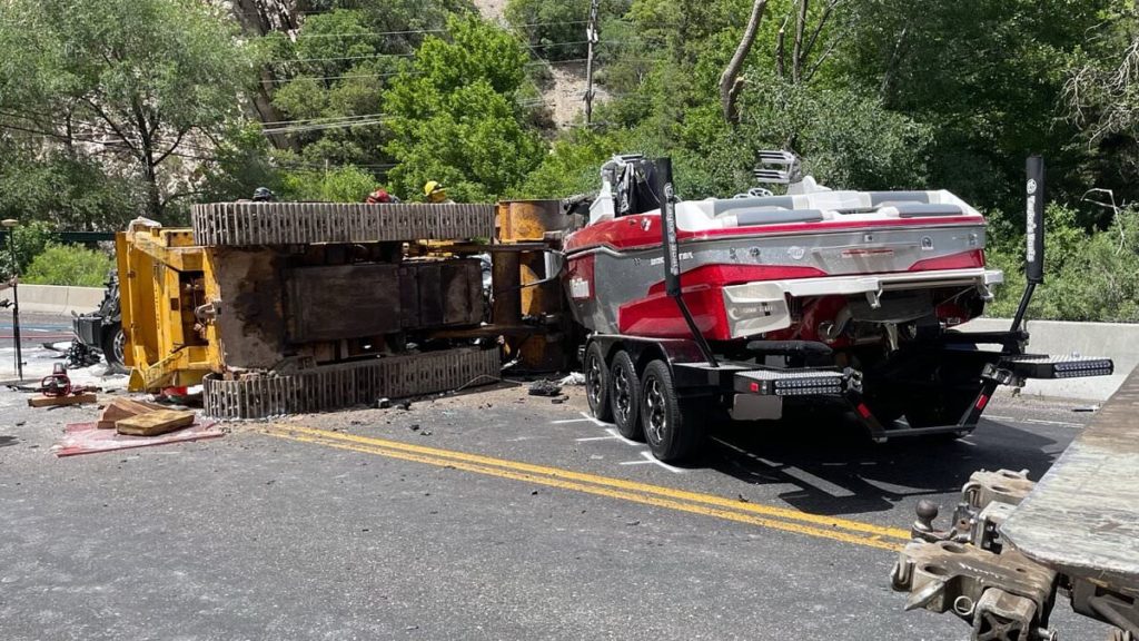 Utah CEO and his daughter are killed in freak accident after bulldozer falls off tow truck and onto their SUV - Daily Mail