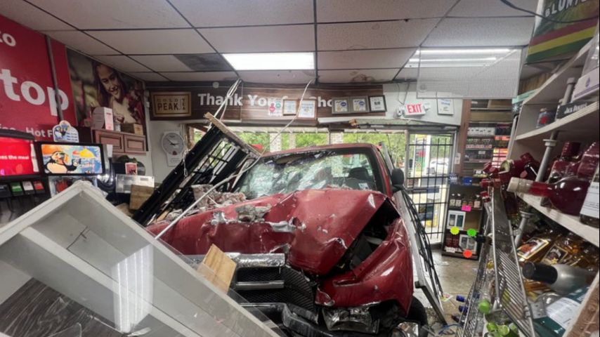 Man cited after truck crashed into convenience store, injured two; residents say intersection is dangerous - WBRZ