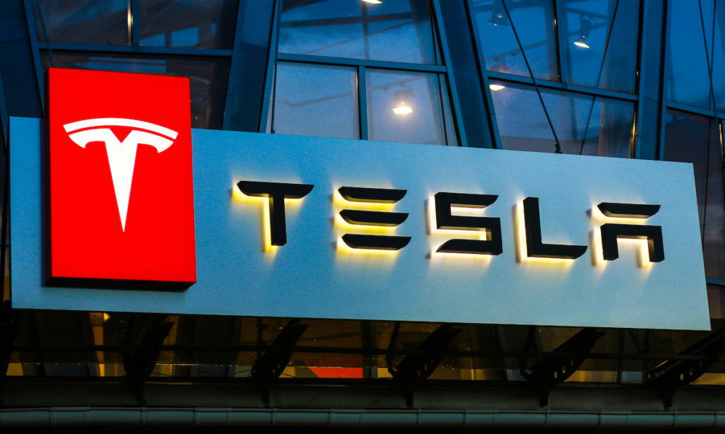 Concha Zaspa, Ukraine - July 20, 2018: Tesla sign on the building on car sales