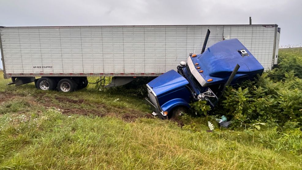 Driver uninjured after semi-truck crash near Grand Rapids - WWMT-TV