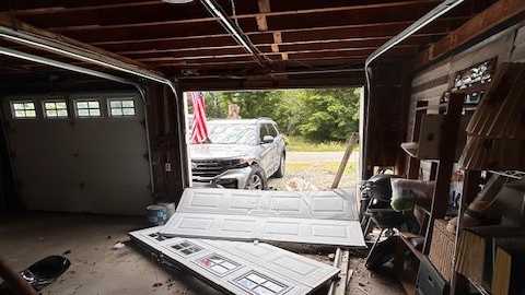 Man crashes into garage and parked car in Parsonsfield, flees scene leaving truck and boat behind - WMTW Portland