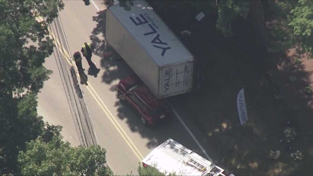 Box truck lands on top of SUV on Mass. road - WCVB Boston