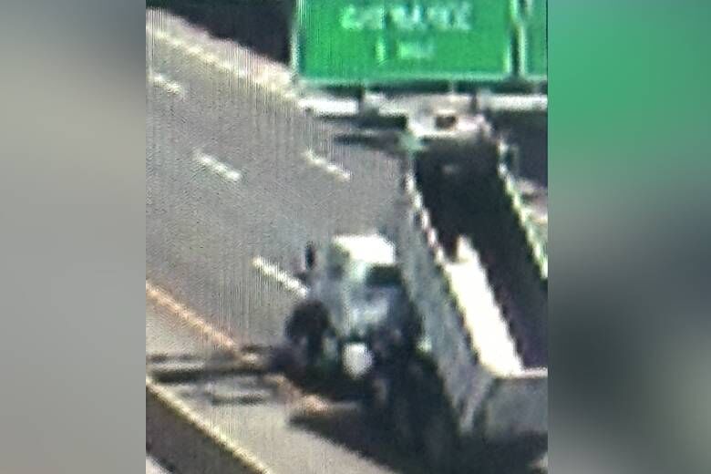 The dump truck sought by police was caught on traffic cameras. However, the video resolution is not sharp enough to identify the license plate number, state police said. (Courtesy Virginia State Police)